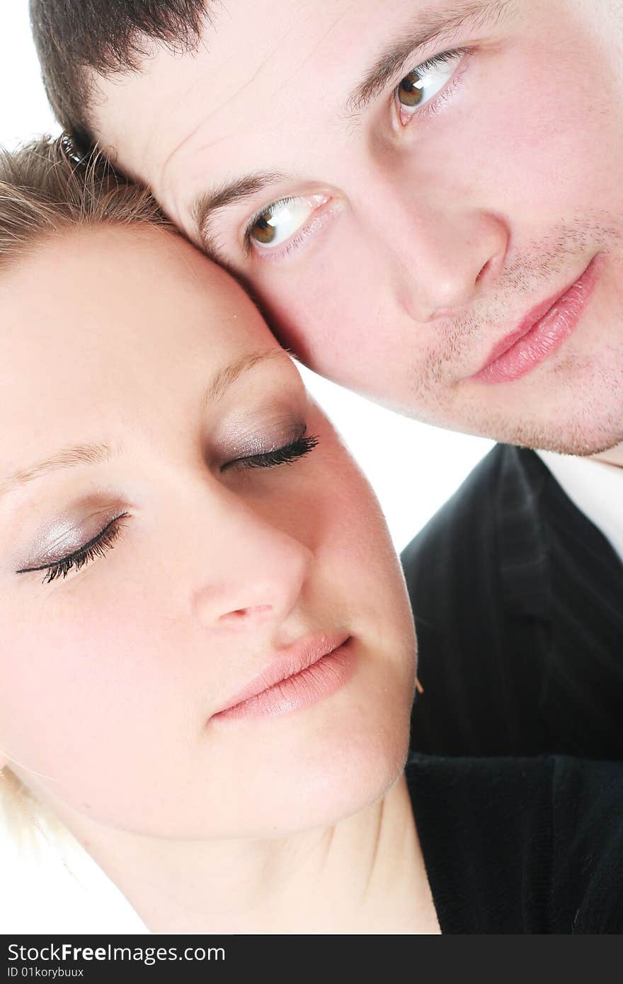 Close-up portrait of beautiful young couple