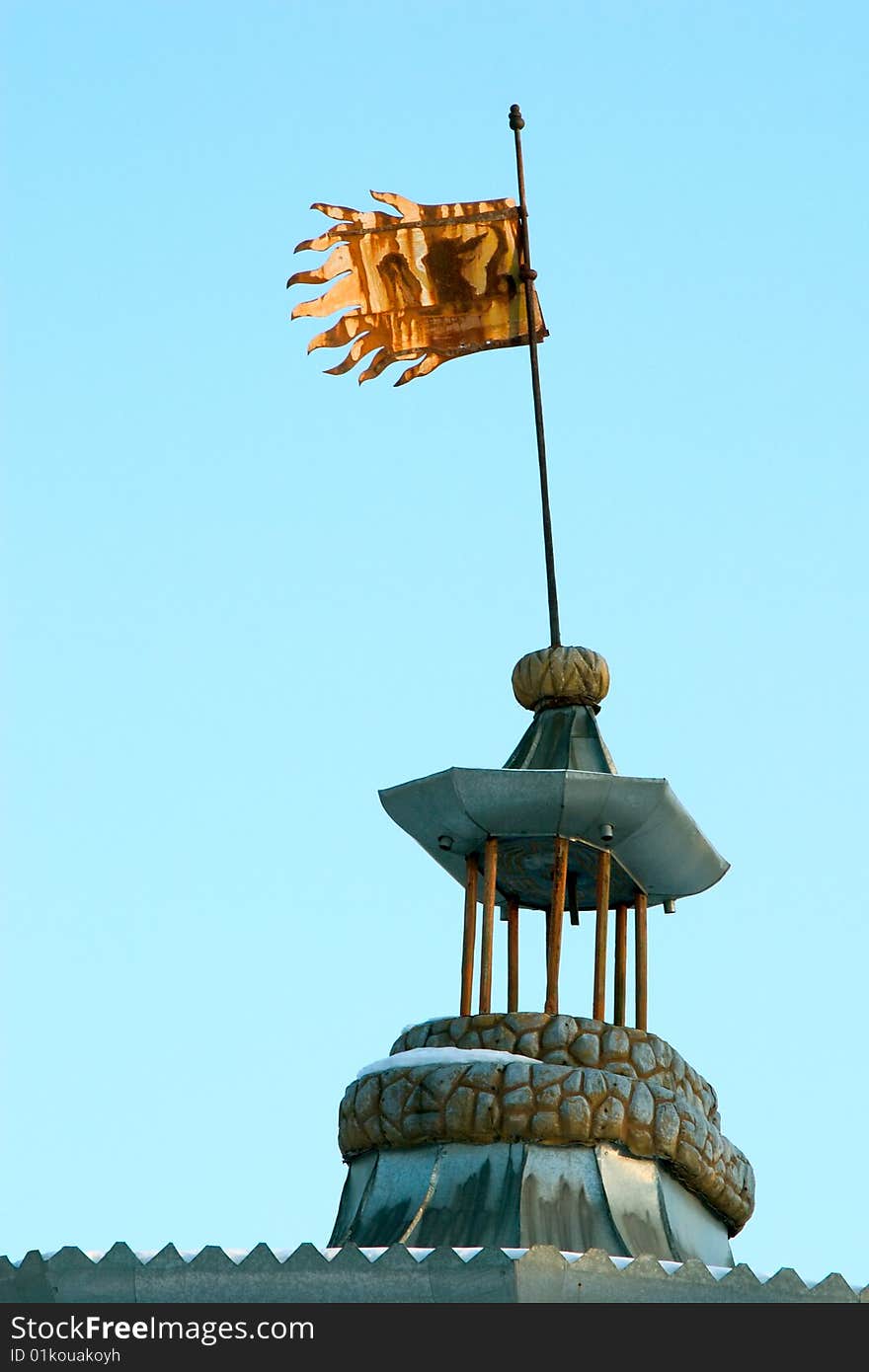 Ragged flag on roof of chinese house (pagoda) in Ekaterina's park in St. Petersburg