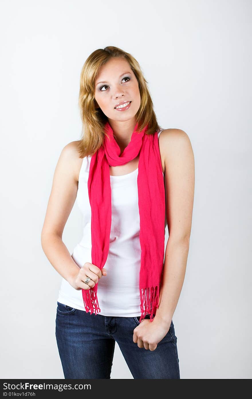 Beauty portrait of a woman on grey background. Beauty portrait of a woman on grey background