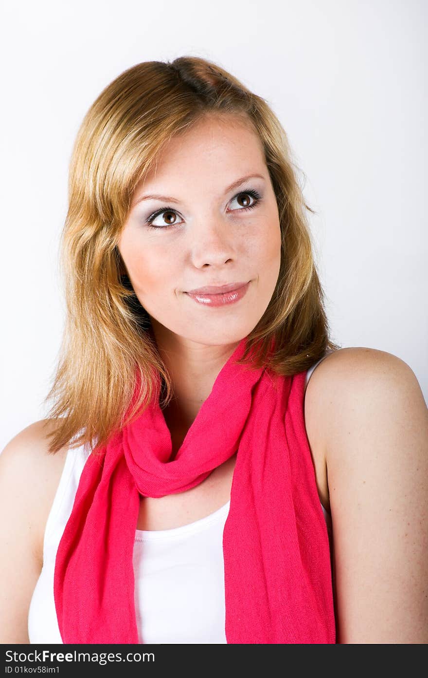 Beauty portrait of a woman on grey background. Beauty portrait of a woman on grey background