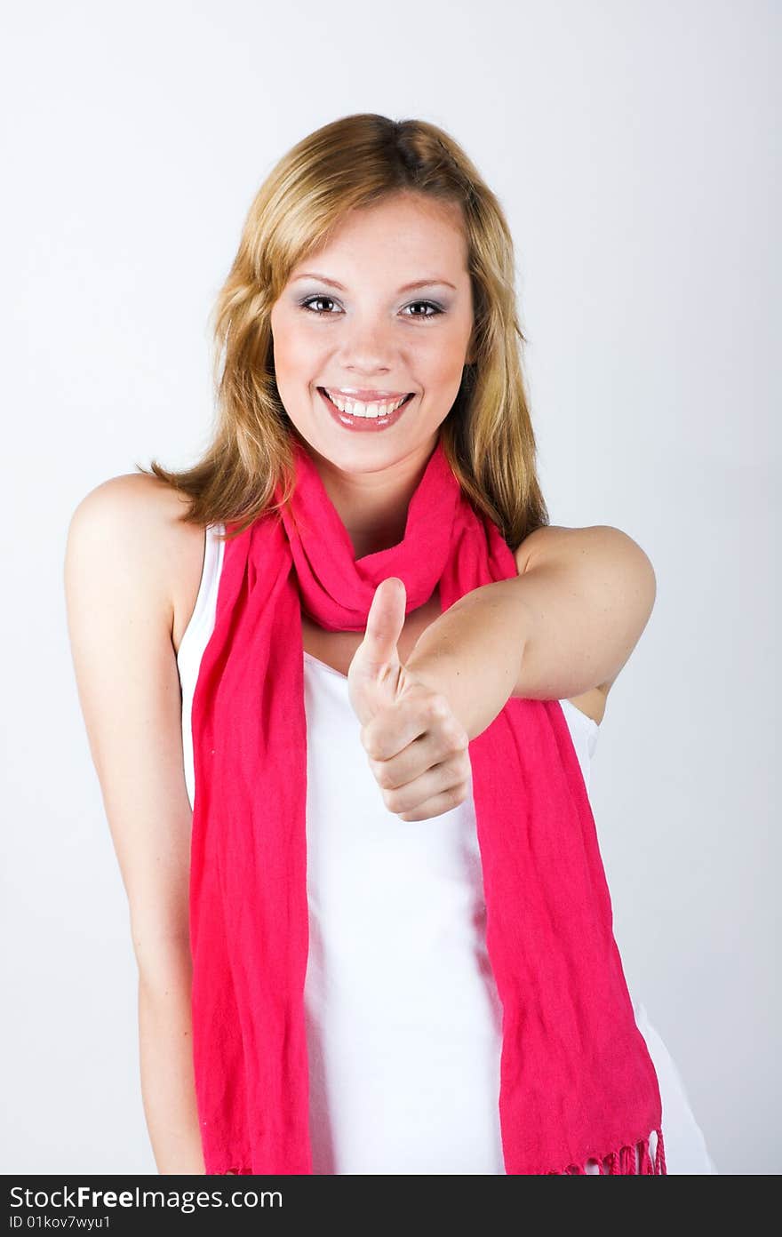 Beauty portrait of a woman on grey background. Beauty portrait of a woman on grey background