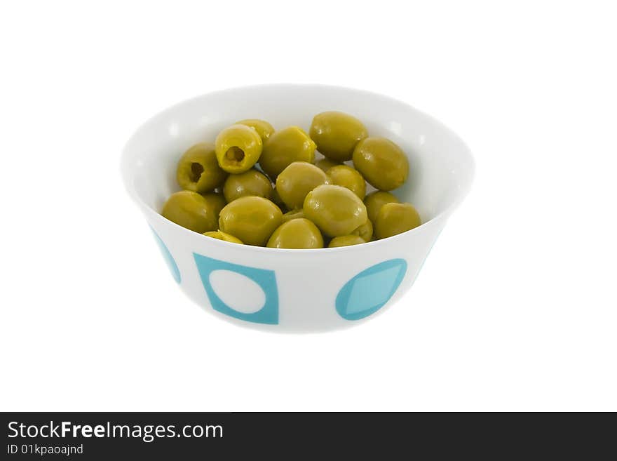 Green olives fruit on the plate isolated over white background