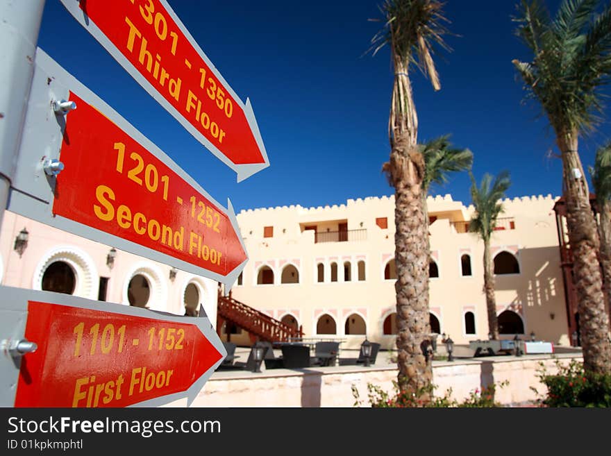 Three red signs in hotel