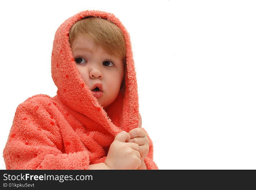 Portrait of the little girl in a dressing gown