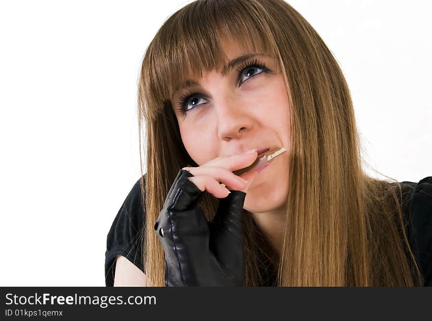 Young girl with chocolate in mouth. Young girl with chocolate in mouth.