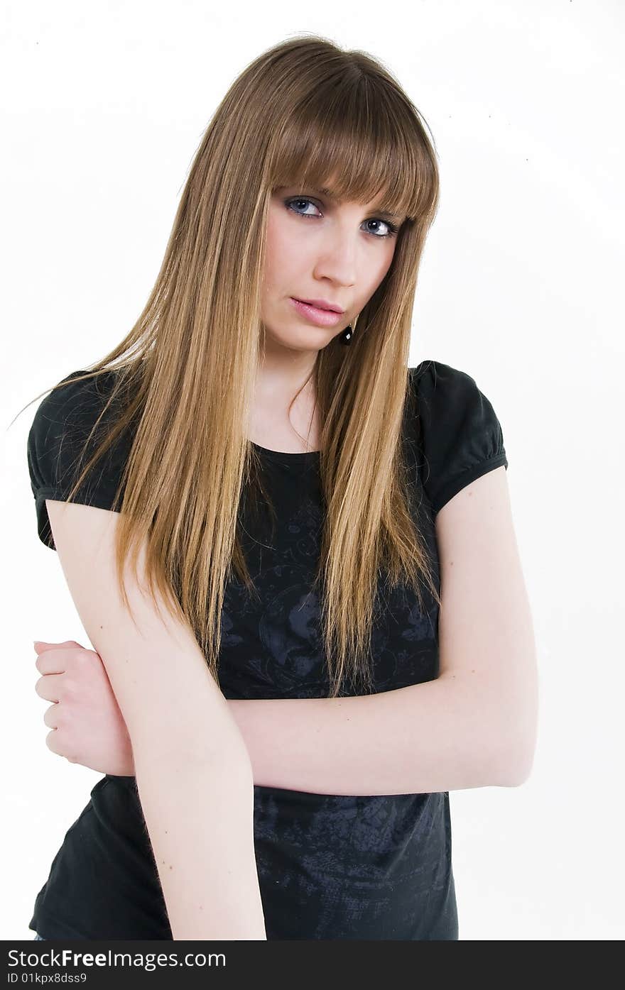 Young girl with blue eyes in black t-shirt.