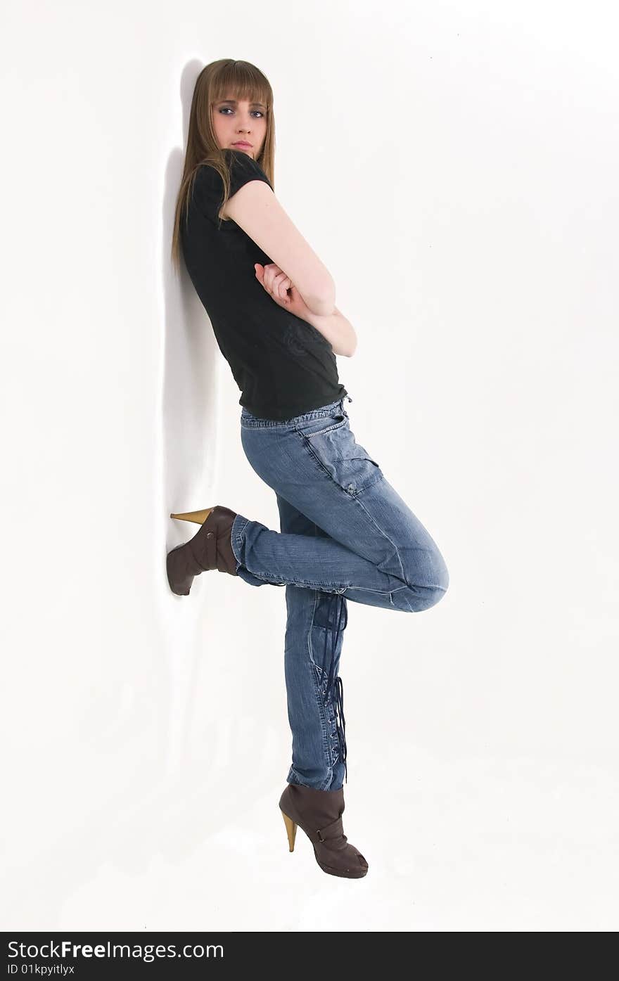 Young girl with blue eyes in black t-shirt.