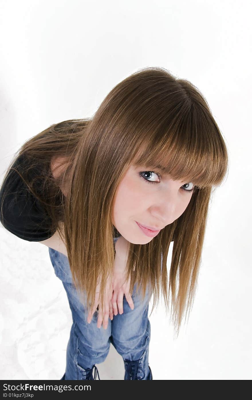 Young girl with blue eyes in black t-shirt.