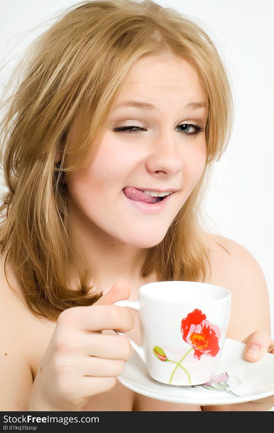 Young woman with a cup of hot drink