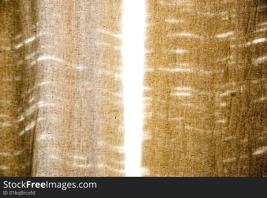 Images of light coming into the room through the window through the blinds unbleached cotton. Images of light coming into the room through the window through the blinds unbleached cotton