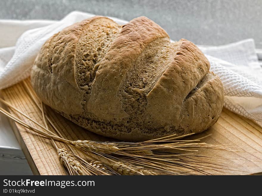 on wheat bread with a wooden board