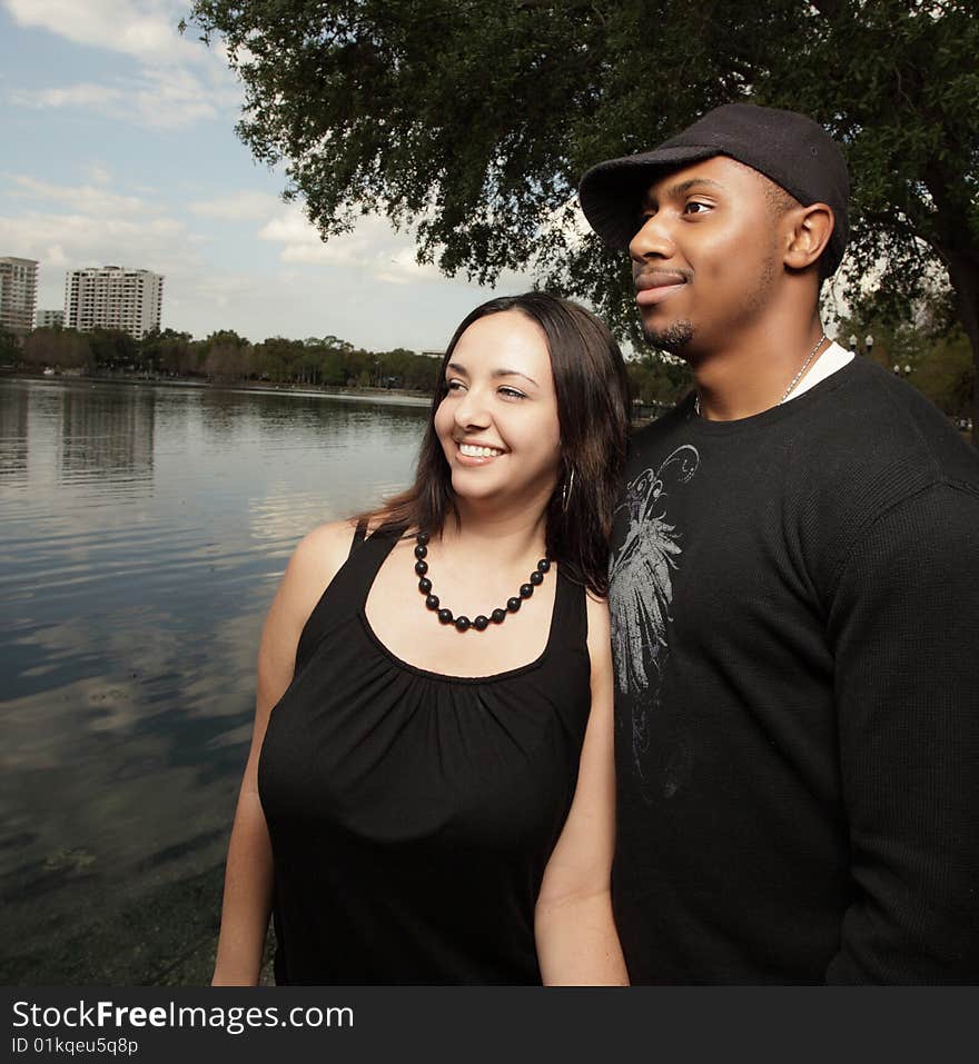 Young couple by the lake