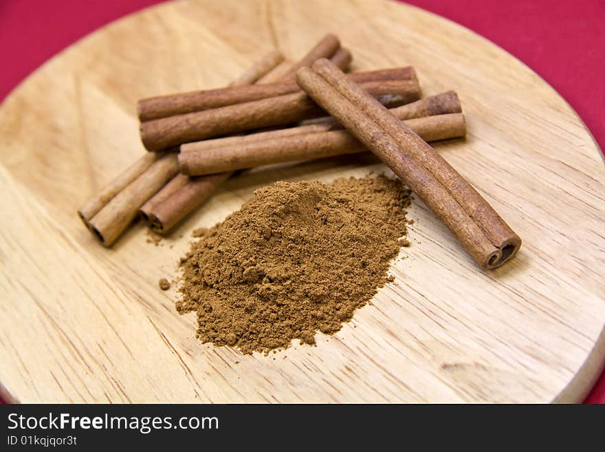 Cinnamon Sticks On Red- Tight Depth Of Field