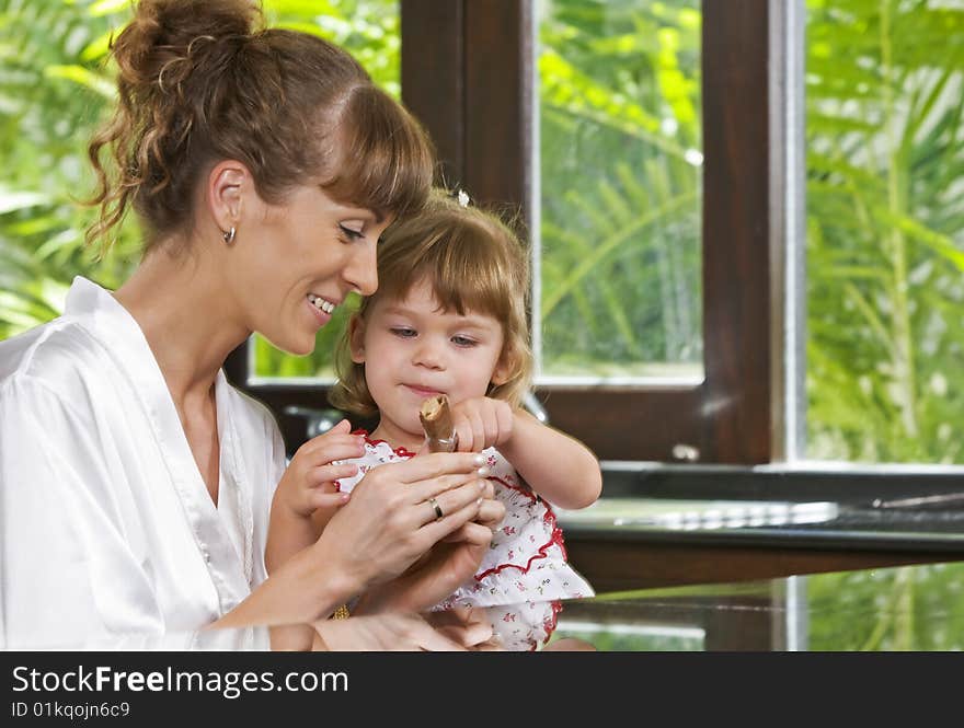 Portrait of beautiful young woman with her daughter. Portrait of beautiful young woman with her daughter