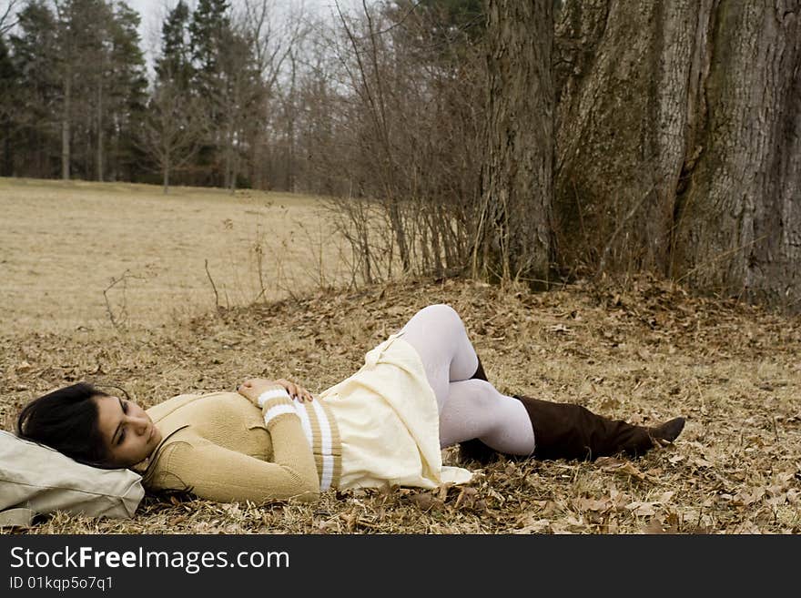 Indian Girl Lying Down in Fall