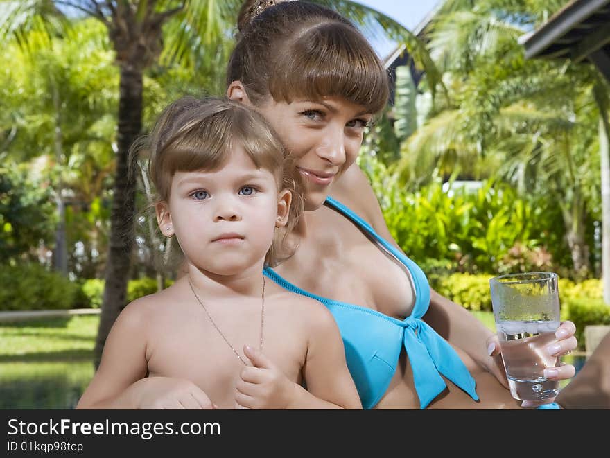 Portrait of beautiful young woman with her daughter. Portrait of beautiful young woman with her daughter