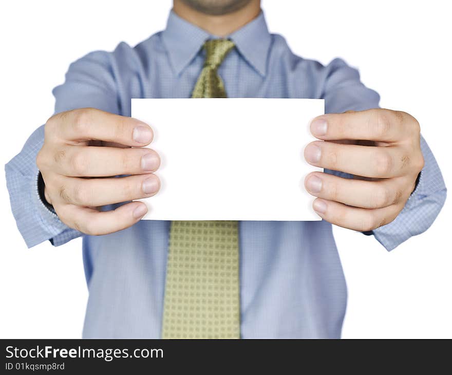 Business man holding a blank white card (focus on the card). Isolated on white.