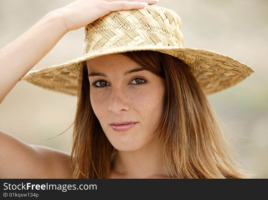 Young Woman With A Hat