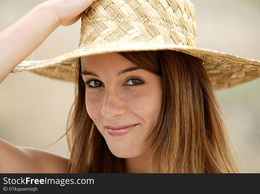 Young woman with a hat