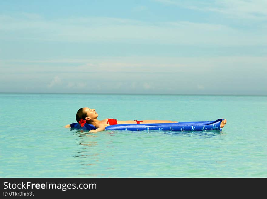 Woman on an air mattress