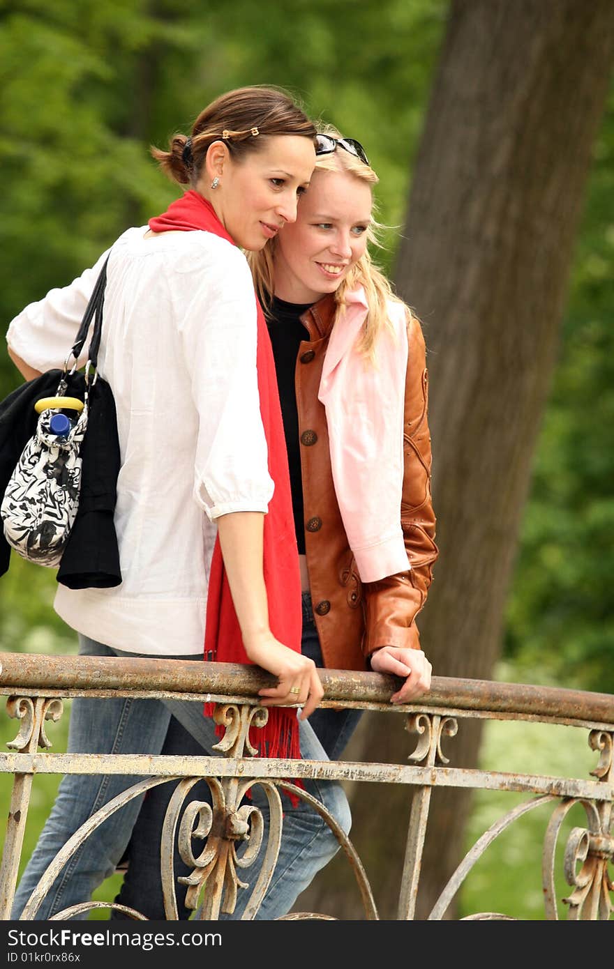 Two girls in autum park