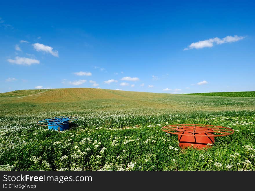 Green wide landscape under blue sky. Green wide landscape under blue sky