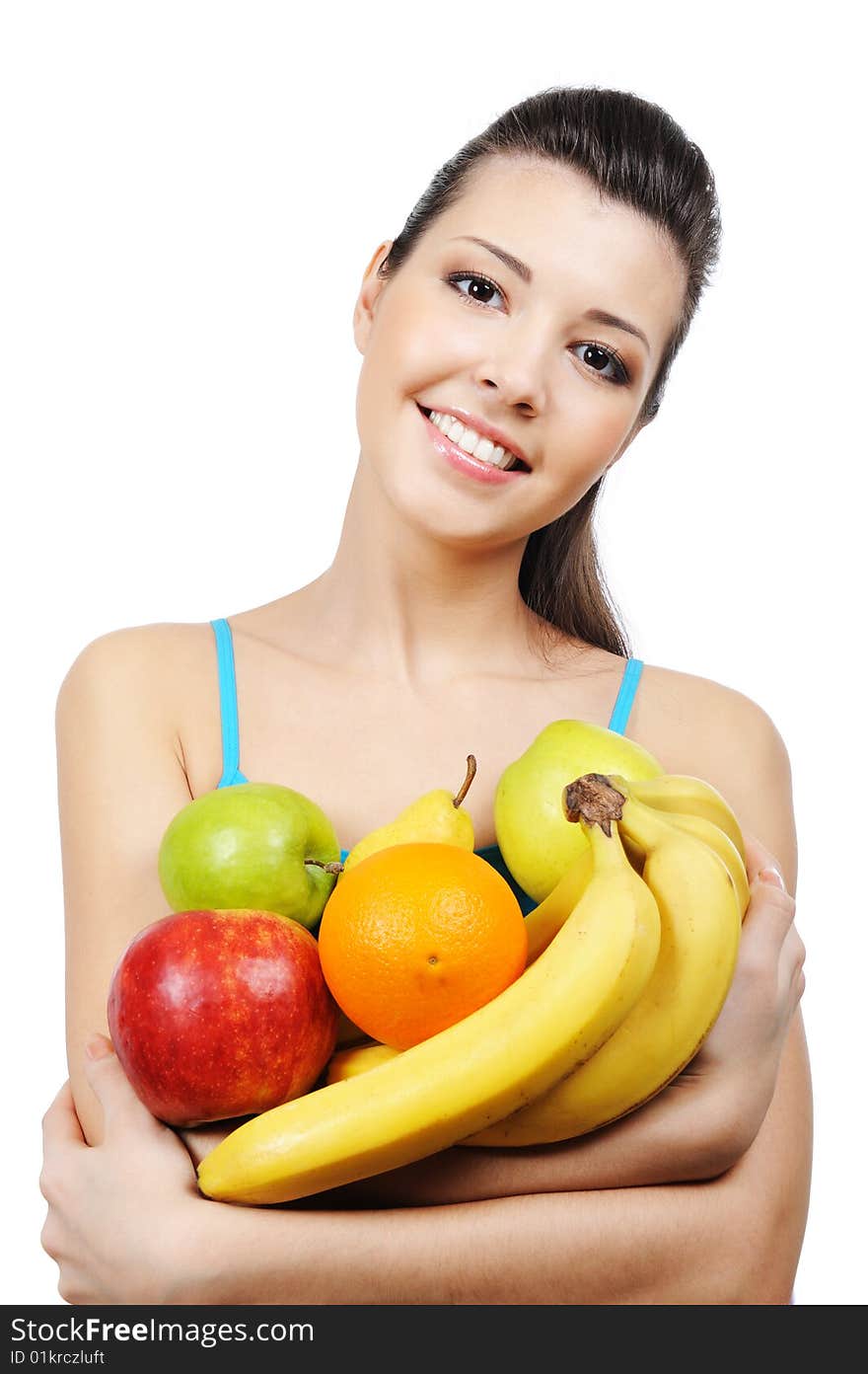 Laughing young woman with fruits