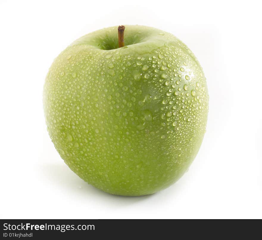 Fresh green apple on table