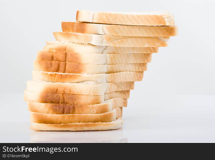 Picture of a white bread loaf sliced