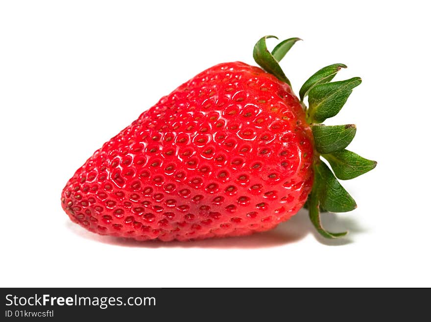 Isolated fresh strawberry on a white background.