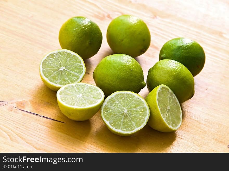 Many Ripe Limes On A Cutting Board