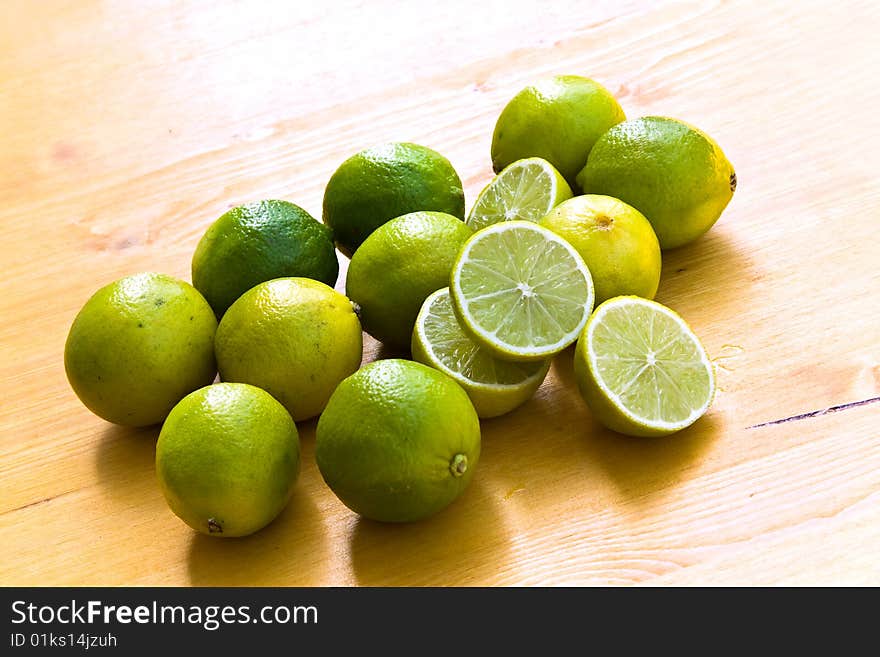 Many Ripe Limes On A Cutting Board