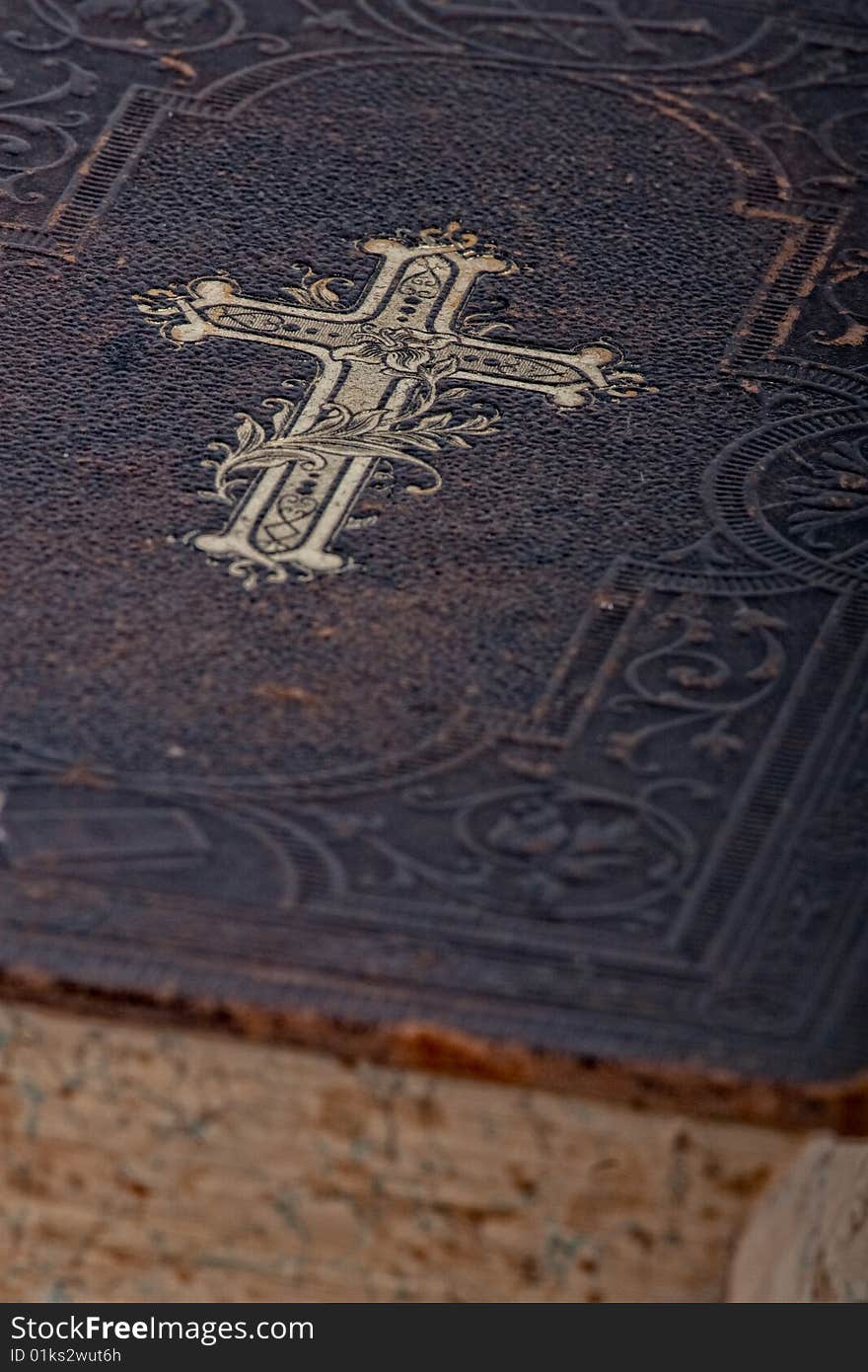 Vintage bible book, closeup on white background