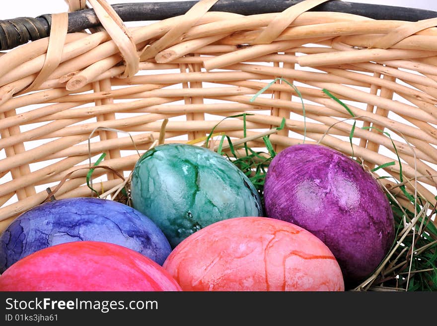 Colorful Easter eggs in one basket