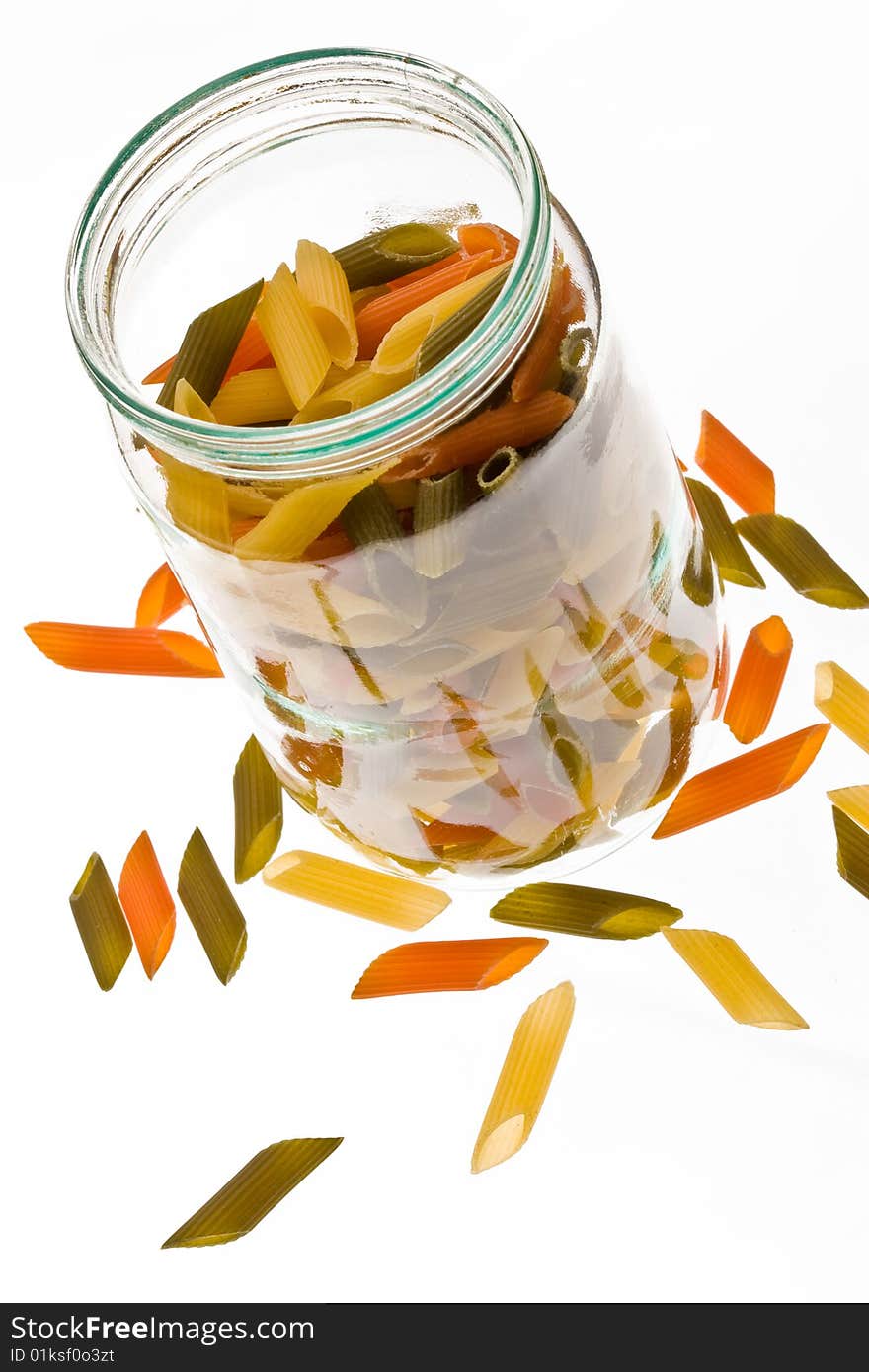 Assorted colours pasta on the jar, colored macaroni