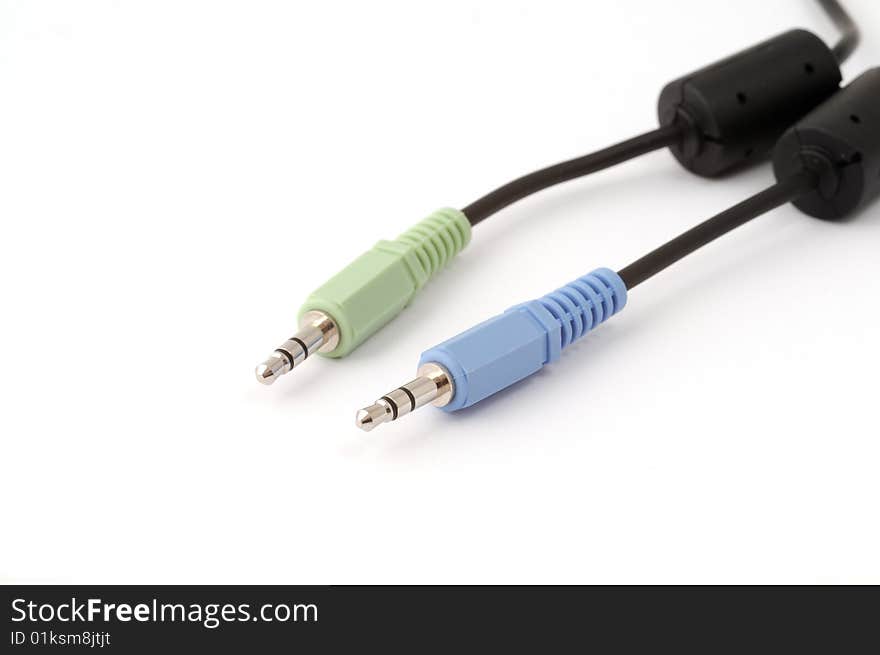 Closeup of plugs on white background