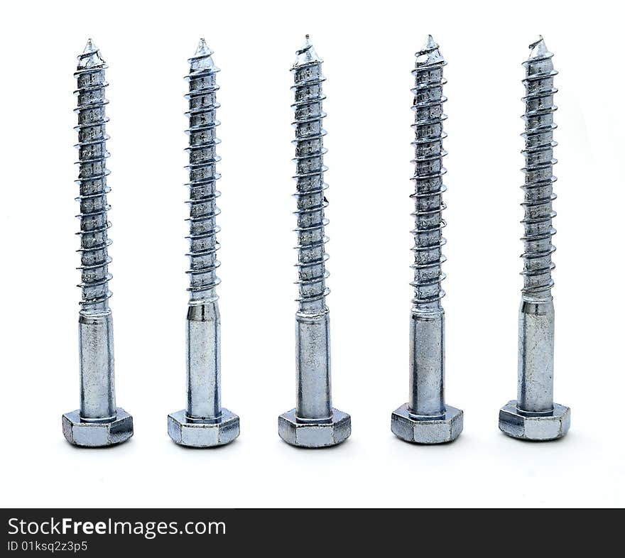 Five brilliant metal screws on a white background