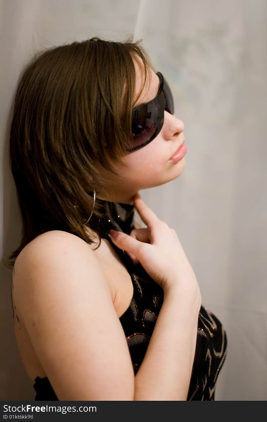 Girl in dark sunglasses