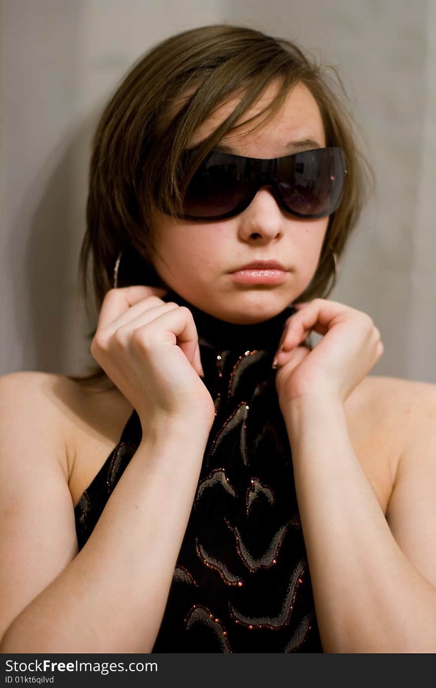 Girl in dark sunglasses