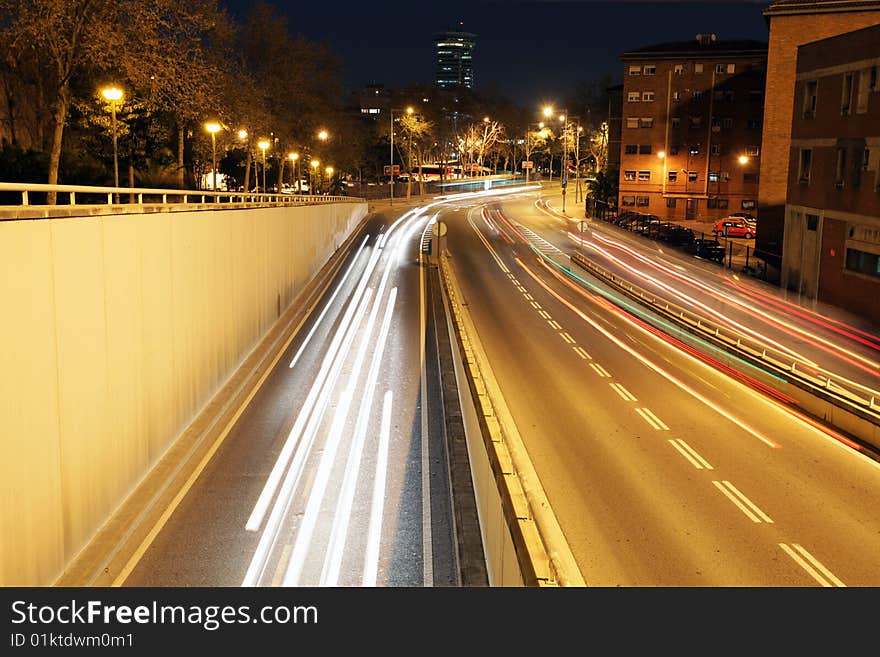 Rush of night time traffic on road in barcelona, spain. Rush of night time traffic on road in barcelona, spain