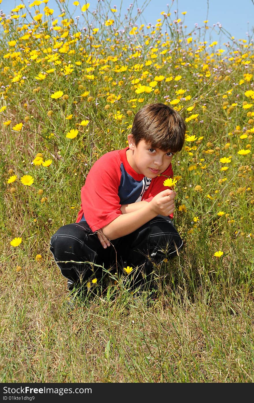 The boy with yellow single Flower