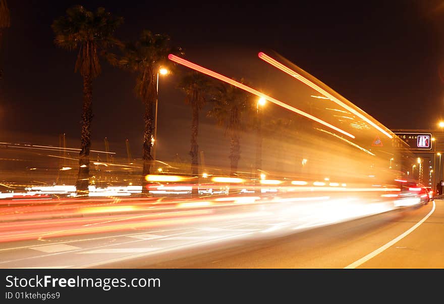 Rush of night time traffic on road in barcelona, spain. Rush of night time traffic on road in barcelona, spain