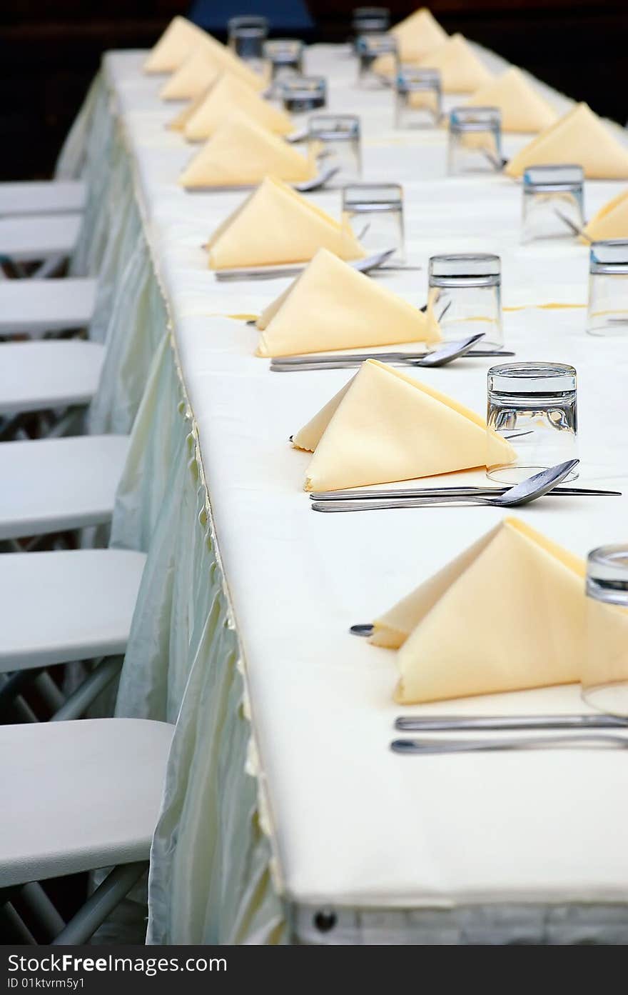 Wine glasses and napkin in line