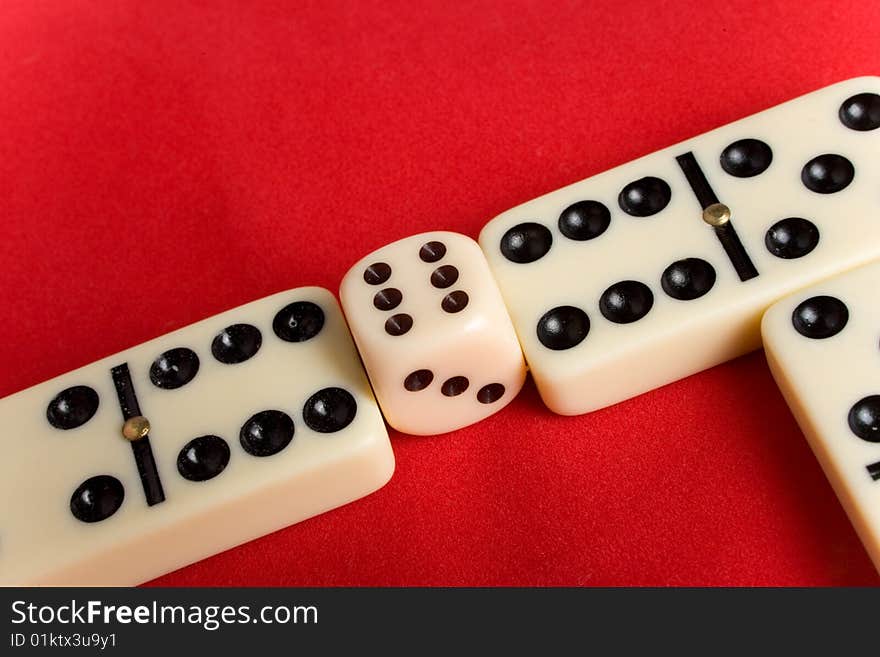 Dice cup and dice on background