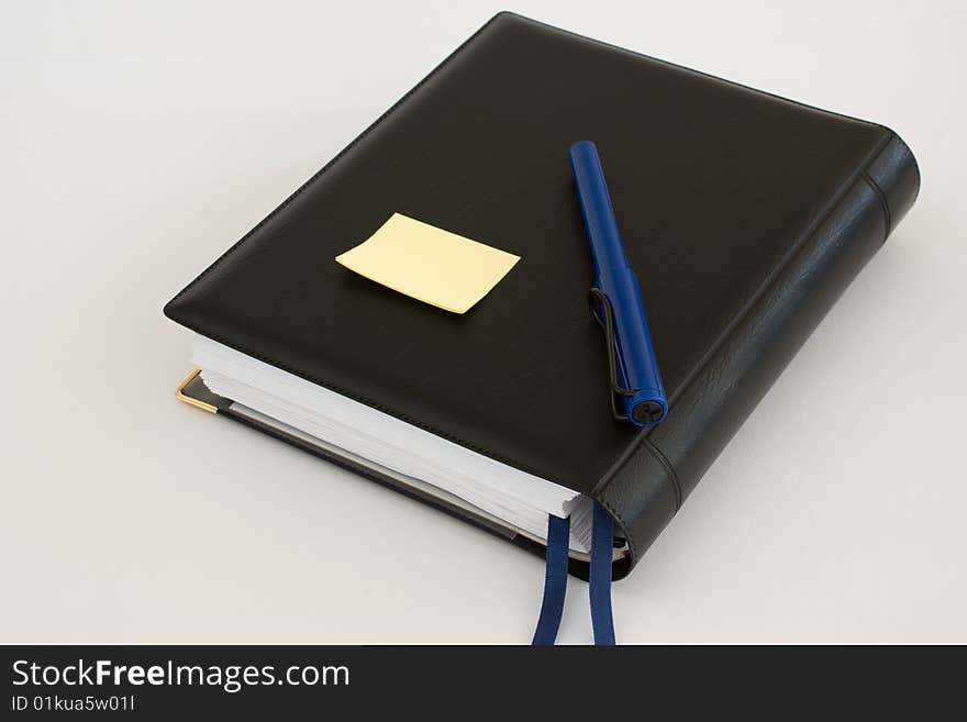 Business Diary Organiser With Blue Pen And Note