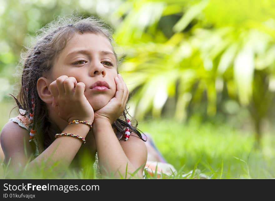 Portrait of little girl having good time in summer environment. Portrait of little girl having good time in summer environment