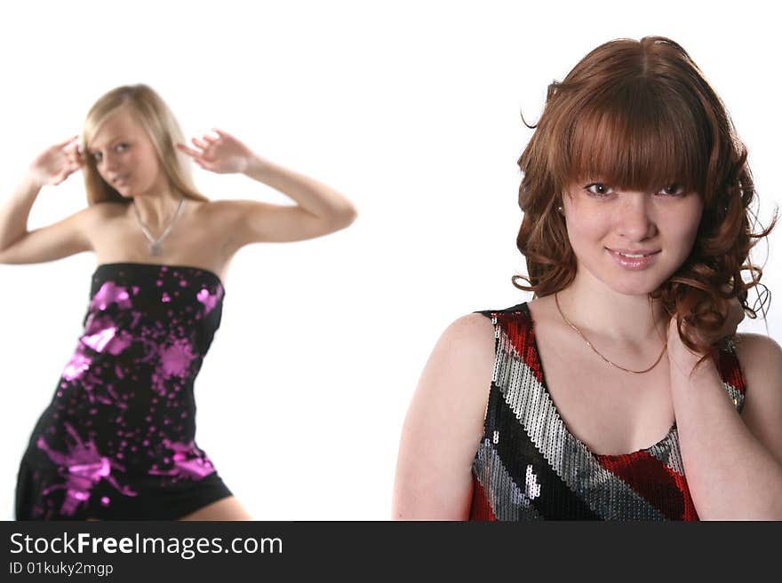 Two girls of the dancer pose in studio. Two girls of the dancer pose in studio