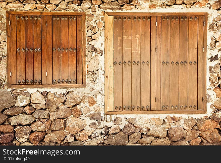 Rustic wall with two windows