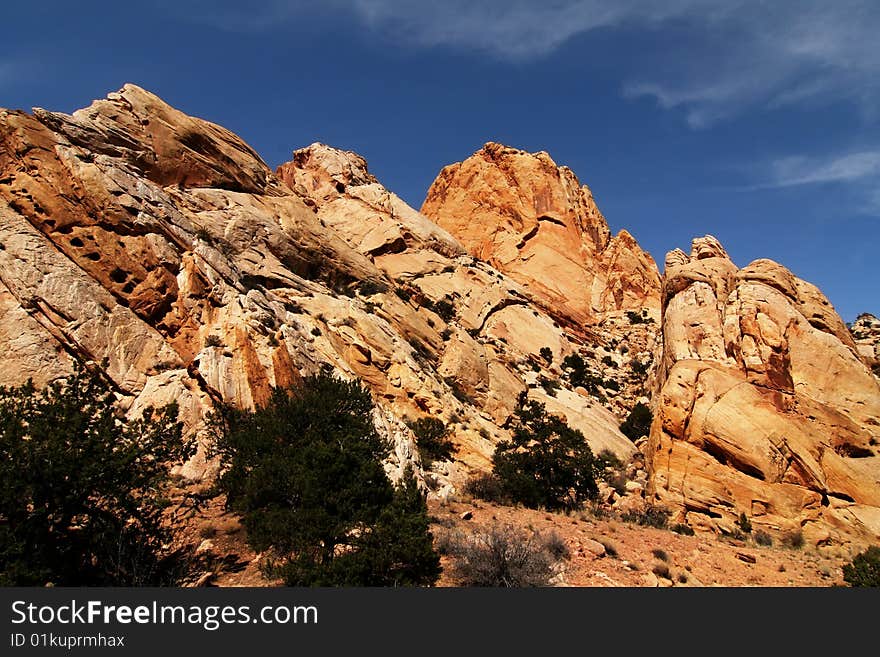 View of red rock formations in San Rafael Swell with blue sky�s