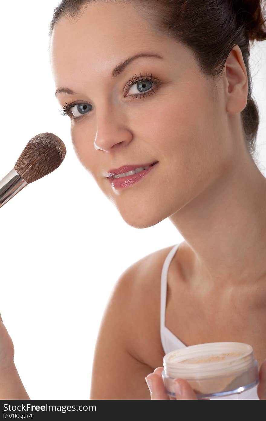 Body care - Young woman with make-up brush